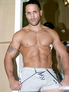 Incredibly handsome and muscular dude poses sensually in his underwear