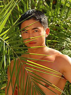 Asian hunk with a shaved chest strips naked and goes skinny dipping