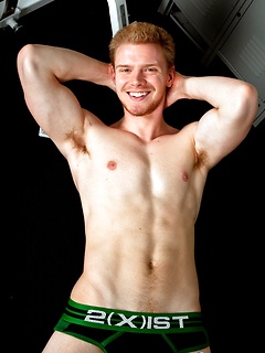 Hunky ginger gay guy with an uncut cock and rock hard abs he shows off