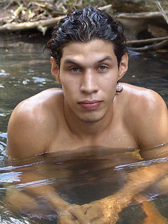 Latin hottie goes for a swim in the rive and plays with his cock until he cums