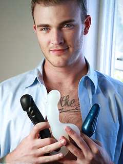 Toy loving gay model Christian Wilde plays with his plugs and strokes his boner