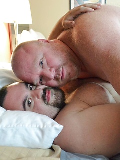 Fat guys in bed suck dick and the bottom takes a hard anal pounding