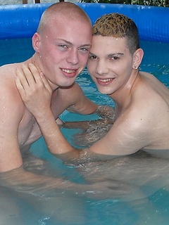 Pierced boys in the pool are so pretty as they kiss each other erotically